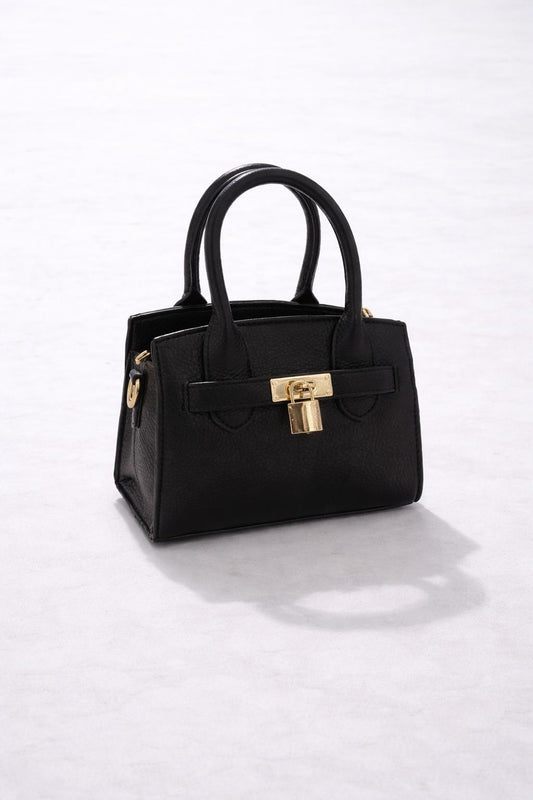 Elegante kleine zwarte handtas met een tijdloos en stijlvol design.